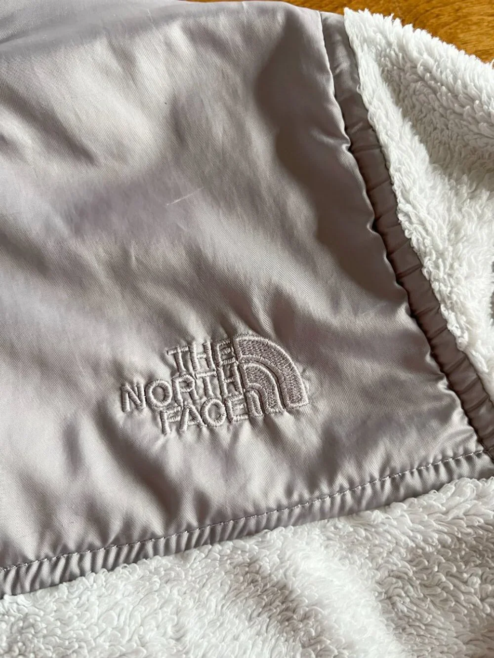 The North Face white and gray fleece hoodie L 14/16